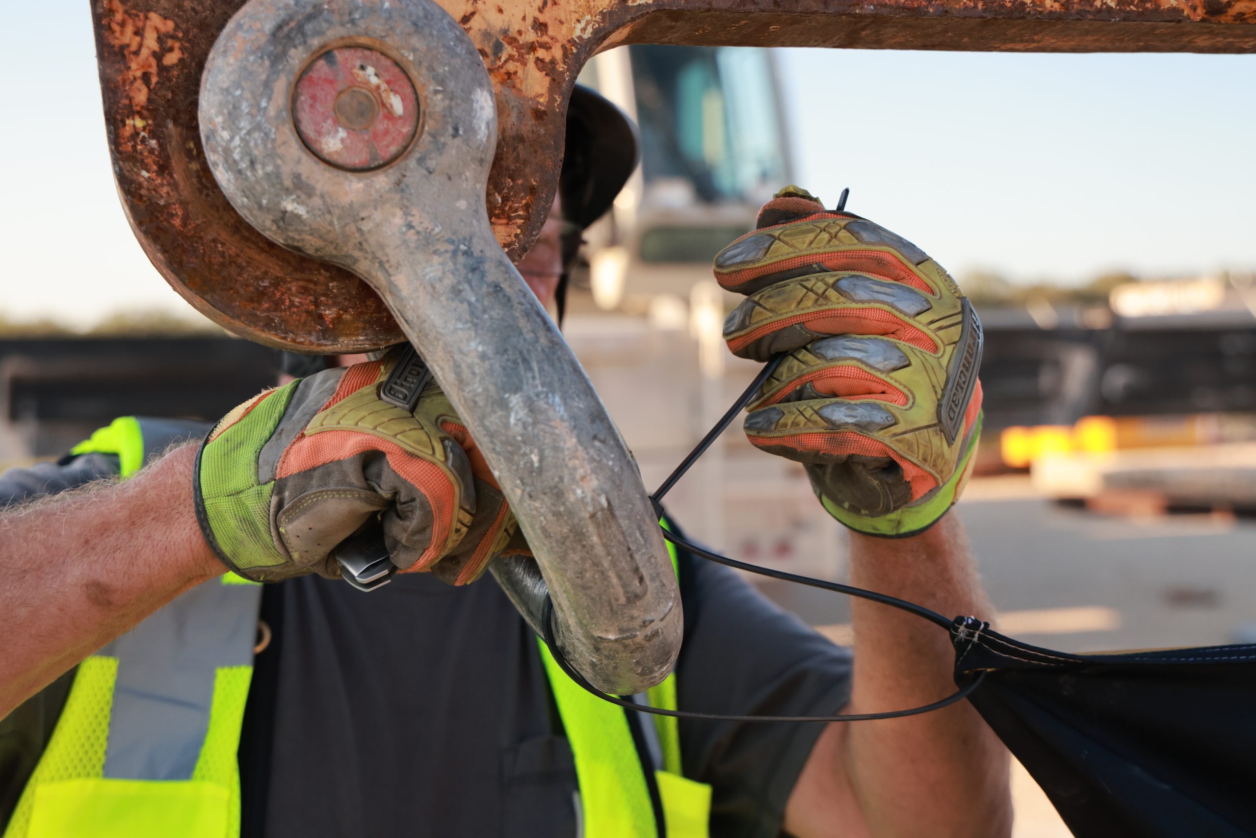 a man holding a large metal object